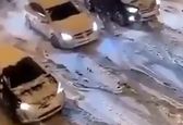 عبور عجیب خودروها از جاده برفی + فیلم