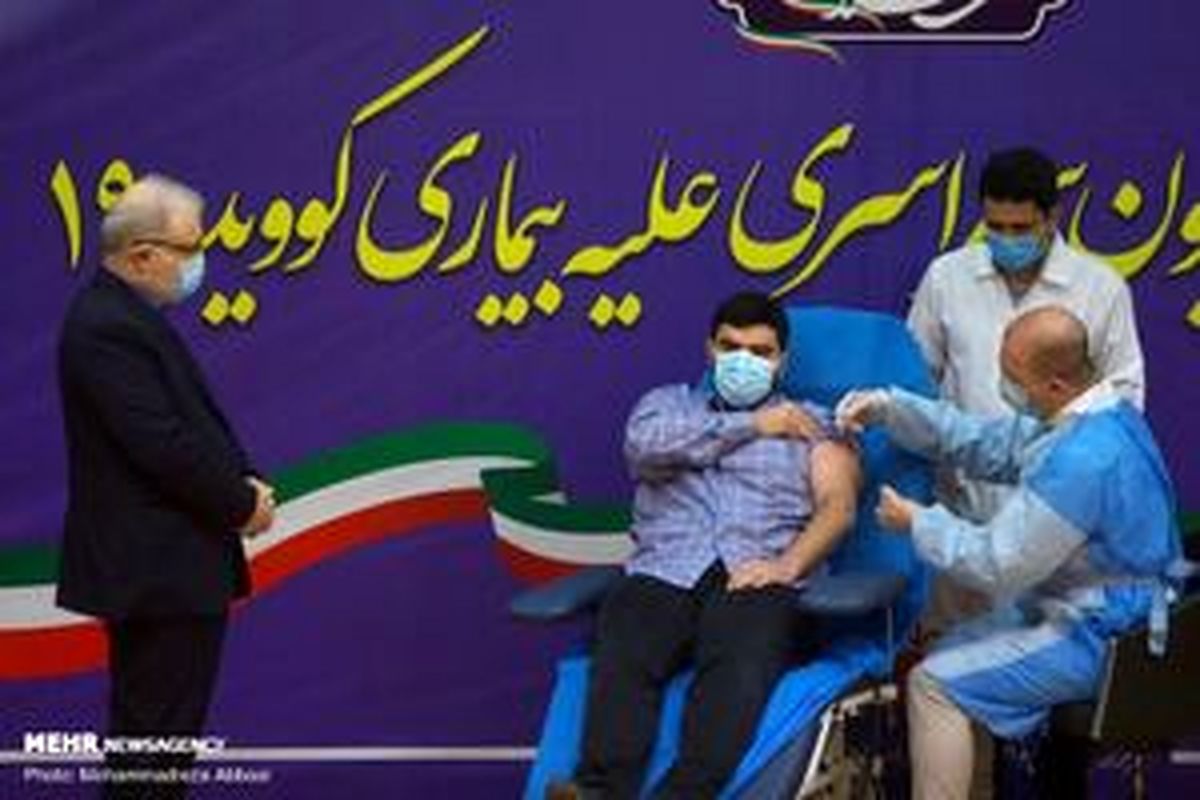 فرزند وزیربهداشت اولین دریافت کننده واکسن +عکس