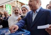 عکسی از دو نامزد ریاست جمهوری پای صندوق رای