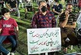 شعار جالب  یکی از حامیان رئیسی در خوزستان+عکس