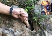 نجات معجزه آسای کودک در حال غرق از تونل آب! +عکس