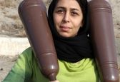 دختر ایرانی که میل می‌زند و کباده می‌کشد +عکس